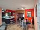 Bright dining area with glass-top table and four chairs at 9021 N 36Th Dr, Phoenix, AZ 85051