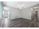 Bright living room with hardwood floors and neutral color palette at 10347 N 115Th Ave, Youngtown, AZ 85363