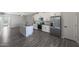 Modern kitchen with stainless steel appliances and granite countertops at 10347 N 115Th Ave, Youngtown, AZ 85363