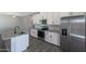 Modern kitchen with stainless steel appliances and granite countertops at 10347 N 115Th Ave, Youngtown, AZ 85363