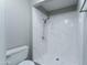 Clean bathroom with walk-in shower and white fixtures at 9614 W Greenhurst Dr, Sun City, AZ 85351
