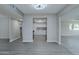 Open dining area with wood-look floors and view of the kitchen at 9614 W Greenhurst Dr, Sun City, AZ 85351