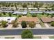 Aerial view of the house and surrounding golf course at 9614 W Greenhurst Dr, Sun City, AZ 85351