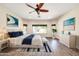 Spacious main bedroom with hardwood floors and picturesque window views at 654 S Sabrina --, Mesa, AZ 85208