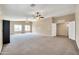 Spacious Primary bedroom with two ceiling fans and ensuite access at 654 S Sabrina --, Mesa, AZ 85208