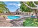 Inviting backyard oasis with sparkling pool and patio at 654 S Sabrina --, Mesa, AZ 85208