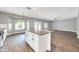 Modern kitchen with white cabinets, granite countertops, and island at 654 S Sabrina --, Mesa, AZ 85208