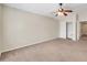 Large bedroom with ceiling fan and walk in closet at 654 S Sabrina --, Mesa, AZ 85208