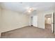 Well-lit bedroom with ceiling fan and closet at 654 S Sabrina --, Mesa, AZ 85208