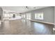 Open living room with hardwood floors and kitchen access at 654 S Sabrina --, Mesa, AZ 85208