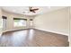 Bright living room with large windows and wood-look flooring at 654 S Sabrina --, Mesa, AZ 85208