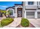 Welcoming front entrance with a walkway and mature landscaping at 654 S Sabrina --, Mesa, AZ 85208