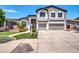 Two-story house with a three-car garage and well-manicured lawn at 654 S Sabrina --, Mesa, AZ 85208
