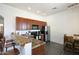 Modern kitchen with stainless steel appliances and a breakfast bar at 37907 N 17Th Pl, Phoenix, AZ 85086