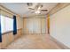 Primary bedroom with ceiling fan and ample closet space at 3330 E Main St # 440, Mesa, AZ 85213