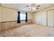 Spacious bedroom with ceiling fan and window coverings at 3330 E Main St # 440, Mesa, AZ 85213