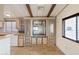 Kitchen with built-in cabinetry, microwave, and a large mirror at 3330 E Main St # 440, Mesa, AZ 85213