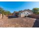 Large backyard with gravel landscaping and block wall at 7242 W Ellis St, Laveen, AZ 85339