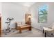 Home office with exercise bike and comfy seating at 20285 N Winter Escape Ct, Maricopa, AZ 85138