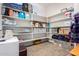 Large pantry with shelving for storage and laundry area at 20285 N Winter Escape Ct, Maricopa, AZ 85138