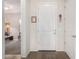 Interior entryway with view into living room and hardwood flooring at 20285 N Winter Escape Ct, Maricopa, AZ 85138