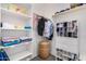 Large walk-in closet with shelving and hanging rods at 20285 N Winter Escape Ct, Maricopa, AZ 85138