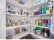 Well-organized pantry with ample shelving for storage at 20285 N Winter Escape Ct, Maricopa, AZ 85138