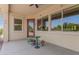 Covered patio with ceiling fan and access to backyard at 20285 N Winter Escape Ct, Maricopa, AZ 85138