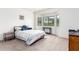 Bright bedroom with neutral decor and ample natural light at 1560 E Melrose Dr, Casa Grande, AZ 85122