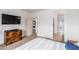 Spacious bedroom with a dresser and a view into the kitchen at 1560 E Melrose Dr, Casa Grande, AZ 85122