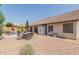 Spacious patio with seating area and adjacent to the pool and storage shed at 4536 E Via Dona Rd, Cave Creek, AZ 85331