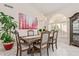 Bright dining room featuring a crystal chandelier and large art at 4536 E Via Dona Rd, Cave Creek, AZ 85331