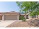 House exterior with a two-car garage and landscaping at 4536 E Via Dona Rd, Cave Creek, AZ 85331
