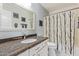 Clean bathroom with granite countertop and shower/tub combo at 4536 E Via Dona Rd, Cave Creek, AZ 85331