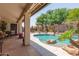 Inviting backyard oasis featuring a sparkling pool and patio at 4536 E Via Dona Rd, Cave Creek, AZ 85331