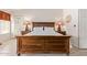 Cozy bedroom with a queen-size bed and wood furniture at 4536 E Via Dona Rd, Cave Creek, AZ 85331