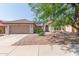 House exterior with a two-car garage and landscaping at 4536 E Via Dona Rd, Cave Creek, AZ 85331