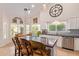 Modern kitchen with granite island, stainless steel appliances, and ample cabinet space at 4536 E Via Dona Rd, Cave Creek, AZ 85331