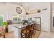 Spacious kitchen with white cabinets, granite island, and stainless steel appliances at 4536 E Via Dona Rd, Cave Creek, AZ 85331