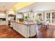 Large kitchen with granite countertops, custom cabinetry, and high-end appliances at 40 Biltmore Est, Phoenix, AZ 85016