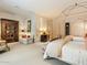 Spacious bedroom with two beds, built-in bookcase, and tranquil atmosphere at 40 Biltmore Est, Phoenix, AZ 85016