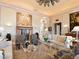 Spacious living room featuring a fireplace, ornate details, and comfortable seating at 40 Biltmore Est, Phoenix, AZ 85016