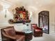 Walk-in wine cellar with brick walls and custom wood shelving at 40 Biltmore Est, Phoenix, AZ 85016