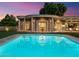 Inviting pool and patio area with stunning sunset views at 40 Biltmore Est, Phoenix, AZ 85016