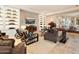 Spacious recreation room with built-in shelving and comfortable seating at 40 Biltmore Est, Phoenix, AZ 85016