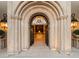 Ornate entry with arched doorway and lighting at 40 Biltmore Est, Phoenix, AZ 85016