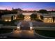 Luxury estate home with circular driveway and gated entry at 40 Biltmore Est, Phoenix, AZ 85016