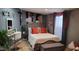 Primary bedroom with plush bed and seating at 5753 N 31St Ln, Phoenix, AZ 85017