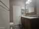 Bathroom with toilet, vanity, and mirrored medicine cabinet at 650 N Hawes Rd # 3404, Mesa, AZ 85207