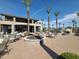 Community patio with fire pit and seating at 650 N Hawes Rd # 3404, Mesa, AZ 85207